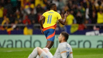Colombia's midfielder #11 Jhon Arias (up) celebrates scoring his team's second goal during the international friendly football match between Romania and Colombia at the Metropolitano stadium in Madrid on March 26, 2024. (Photo by OSCAR DEL POZO / AFP)