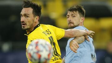 Soccer Football - Champions League - Group F - Borussia Dortmund v Lazio - Signal Iduna Park, Dortmund, Germany - December 2, 2020 Borussia Dortmund's Mats Hummels in action with Lazio's Francesco Acerbi REUTERS/Leon Kuegeler