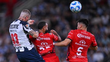 Sergio Ramos (L) of Monterrey fights for the ball with Jordan Sierra (C) and Facundo ALmada (R) of Monterrey during the 5th round match between Monterrey vs Mazatlan FC as part of the Liga BBVA MX, Torneo Apertura 2025 at BBVA Bancomer Stadium, on August 17, 2025 in Monterrey, Nuevo Leon, Mexico.