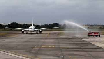 Lagos (Nigeria), 05/09/2020.- The Airbus A330-200 airplane operating Middle East Airlines (MEA) flight ME1571 is ceremonially welcomed with a water cannon demonstration by firefighters as it taxies on a runway after landing at the Murtala Muhammed Interna