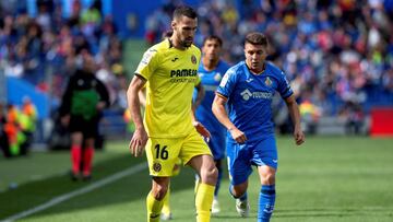 GRAF3415. GETAFE (MADRID), 18/05/2019.- El jugador del Villarreal Alfonso Pedraza (i) controla el balón ante el jugador del Getafe Francisco Portillo (d), durante el partido de la trigésima octava jornada de LaLiga que se disputa esta tarde