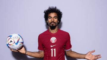 DOHA, QATAR - NOVEMBER 16: Akram Afif of Qatar poses during the official FIFA World Cup Qatar 2022 portrait session on November 16, 2022 in Doha, Qatar. (Photo by Catherine Ivill - FIFA/FIFA via Getty Images)