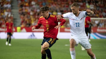 Spain's midfielder Gavi (L) vies with Czech Republic's midfielder Tomas Soucek during the UEFA Nations League, league A group 2 football match between Spain and Czech Republic at at La Rosaleda stadium in Malaga on June 12, 2022. (Photo by JORGE GUERRERO / AFP)