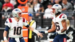 LAS VEGAS, NEVADA - DECEMBER 18: Mac Jones #10 of the New England Patriots and Jakobi Meyers #16 reacts during the first half against the Las Vegas Raiders at Allegiant Stadium on December 18, 2022 in Las Vegas, Nevada.   Chris Unger/Getty Images/AFP (Photo by Chris Unger / GETTY IMAGES NORTH AMERICA / Getty Images via AFP)
