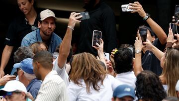 Mar 28, 2025; Miami, FL, USA; Inter Miami forward Lionel Messi (T-L) poses for fans in the stands after the match between Novak Djokovic (SRB) and Grigor Dmitrov (BUL)(both not pictured) in a men's singles semifinal on day eleven of the Miami Open at Hard Rock Stadium. Mandatory Credit: Geoff Burke-Imagn Images TPX IMAGES OF THE DAY