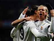 MADRID, SPAIN - MARCH 10: Cristiano Ronaldo (L) of Real Madrid celebrates with his teammate Guti (R) after scoring during the UEFA Champions League round of sixteen, second leg match between Real Madrid and Lyon at Estadio Santiago Bernabeu on March 10, 2010 in Madrid, Spain. (Photo by Elisa Estrada/Real Madrid via Getty Images)