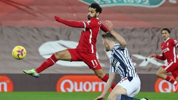 Liverpool&#039;s Egyptian midfielder Mohamed Salah controls the ball during the English Premier League football match between Liverpool and West Bromwich Albion at Anfield in Liverpool, north west England on December 27, 2020. (Photo by Nick Potts / POOL 