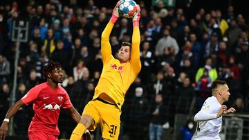 Leipzig�s Spanish goalkeeper Josep Martinez saves the ball during the German Cup (DFB Pokal) second round football match SV Babelsberg vs RB Leipzig in Potsdam, eastern Germany on October 26, 2021. (Photo by Tobias Schwarz / AFP) / DFB REGULATIONS PROHIBIT ANY USE OF PHOTOGRAPHS AS IMAGE SEQUENCES AND QUASI-VIDEO.