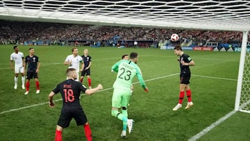 MOSCOW, RUSSIA - JULY 11:  Sime Vrsaljko of Croatia heads the ball clear of the line from a header on target from John Stones of England during the 2018 FIFA World Cup Russia Semi Final match between England and Croatia at Luzhniki Stadium on July 11, 201