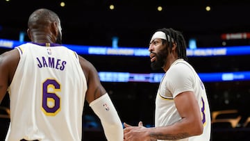 LOS ANGELES, CA - MARCH 26: Anthony Davis #3 of the Los Angeles Lakers talks with LeBron James #6 during the first half against at Crypto.com Arena on March 26, 2023 in Los Angeles, California. NOTE TO USER: User expressly acknowledges and agrees that, by downloading and or using this photograph, User is consenting to the terms and conditions of the Getty Images License Agreement.  Kevork Djansezian/Getty Images/AFP (Photo by KEVORK DJANSEZIAN / GETTY IMAGES NORTH AMERICA / Getty Images via AFP)