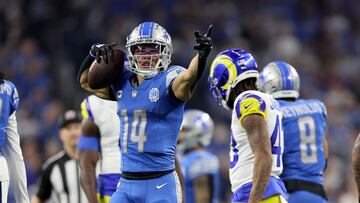 Amon-Ra St. Brown, #14 of the Detroit Lions, reacts after making a first down during the third quarter against the Los Angeles Rams in the NFC Wild Card Playoffs at Ford Field on January 14, 2024, in Detroit, Michigan.