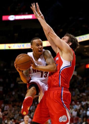 Shabazz Napier y Spencer Hawes.