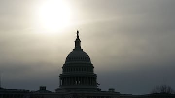 (FILES) In this file photo the US Capitol dome is viewed on February 20, 2020 in Washington,DC. - US lawmakers appeared on track December 20, 2020 to pass a roughly $900 billion Covid-19 relief package for millions of Americans, after Democrats and Republ