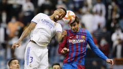 Soccer Football - Spanish Super Cup - Semi Final - Real Madrid v FC Barcelona - King Fahd International Stadium, Riyadh, Saudia Arabia - January 12, 2022 Real Madrid's Eder Militao in action with FC Barcelona's Gerard Pique REUTERS/Ahmed Yosri