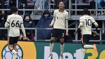 Liverpool&#039;s Brazilian midfielder Fabinho (C) celebrates scoring the opening goalduring the English Premier League football match between Burnley and Liverpool at Turf Moor in Burnley, north west England on February 13, 2022. (Photo by Paul ELLIS / AF