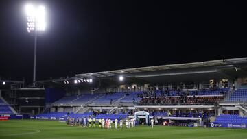 HUESCA, SPAIN - APRIL 09:  Players line up ahead of the La Liga Santader match between SD Huesca and Elche CF at Estadio El Alcoraz on April 09, 2021 in Huesca, Spain. Sporting stadiums around Spain remain under strict restrictions due to the Coronavirus 