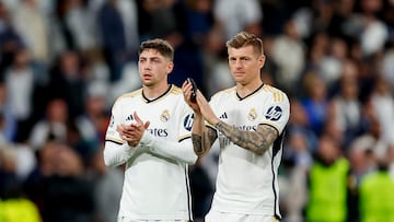 MADRID, SPAIN - APRIL 9: Federico Valverde of Real Madrid and Toni Kroos of Real Madrid looks on during the UEFA Champions League quarter-final first leg match between Real Madrid CF and Manchester City at Estadio Santiago Bernabeu on April 9, 2024 in Madrid, Spain. (Photo by Manuel Reino/DeFodi Images via Getty Images)