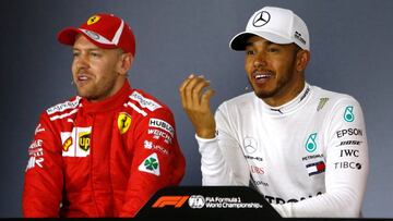 Formula One F1 - Australian Grand Prix - Melbourne Grand Prix Circuit, Melbourne, Australia - March 24, 2018 Ferrari's Sebastian Vettel and Mercedes' Lewis Hamilton during the press conference after qualifying REUTERS/Brandon Malone