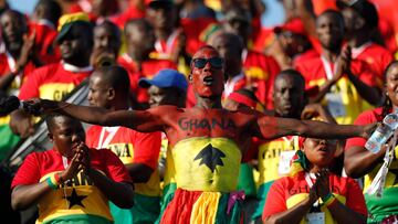 A Ghana supporter cheers ahead of the 2019 Africa Cup of Nations (CAN) Group F football match between Guinea-Bissau and Ghana at the Suez Stadium in the north-eastern Egyptian city on July 2, 2019. (Photo by FADEL SENNA / AFP)