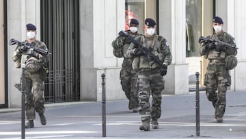 PARIS, FRANCE - APRIL 22: French Soldiers wearing masks are seen patrolling Boulevard De La Madeleine on April 22, 2020 in Various Cities, France. The Coronavirus (COVID-19) pandemic has spread to many countries across the world, claiming over 170,000 li