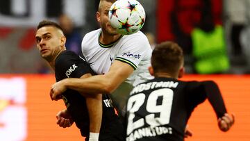 Soccer Football - Champions League - Group D - Eintracht Frankfurt v Tottenham Hotspur - Deutsche Bank Park, Frankfurt, Germany - October 4, 2022 Tottenham Hotspur's Eric Dier in action with Eintracht Frankfurt's Rafael Santos Borre REUTERS/Kai Pfaffenbach