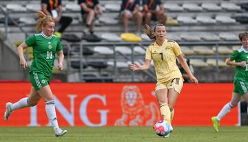 Northern Ireland's Rachel Furness tracks Belgium's Hannah Eurlings during the teams' friendly match on 23 June.