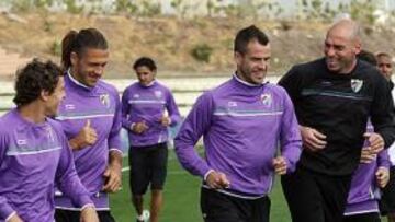 <b>BUEN ROLLO. </b>Seba, Demichelis, Duda y Caballero, sonriendo en la sesión de ayer.