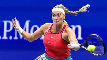 (FILES) In this file photo taken on August 30, 2023 Czech Republic's Petra Kvitova plays a forehand return against Denmark's Caroline Wozniacki during the US Open tennis tournament women's singles second round match at the USTA Billie Jean King National Tennis Center in New York City. Two-time Wimbledon champion Petra Kvitova said on February 3, 2025 she was returning to the sport seven months after giving birth to a son. "After fifteen months being away from tennis and having my baby boy Petr, I'm coming back to the tennis circuit," Kvitova said in a video message on Instagram. (Photo by COREY SIPKIN / AFP)