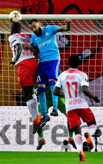 RB Leipzig's French defender Dayot Upamecano goes up against Marseille's Greek forward Konstantinos Mitroglou in the Uefa Europa League quarter-final first leg.