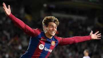 Barcelona's Spanish forward #38 Marc Guiu celebrates after scoring his team's first goal during the Spanish league football match between FC Barcelona and Athletic Club Bilbao at the Estadi Olimpic Lluis Companys in Barcelona on October 22, 2023. (Photo by Josep LAGO / AFP)