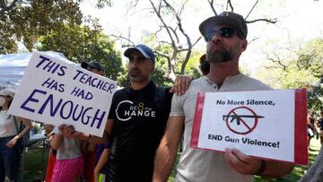 Protestors hold signs and listen to speakers during the March For Our Lives: Los Angeles protest calling for action and change on gun violence.