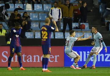 Iago Aspas celebrates scoring Celta's second goal against Barcelona. (2-2)
