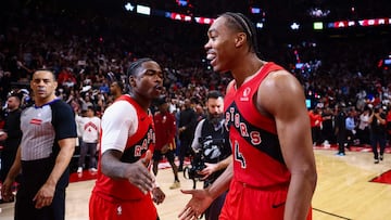 TORONTO, CANADA - APRIL 26: Scottie Barnes #4 and Jamal Shead #23 of the Toronto Raptors celebrate at the end of Game Four of the Eastern Conference First Round NBA Playoffs against the Cleveland Cavaliers at Scotiabank Arena on April 26, 2026 in Toronto, Ontario, Canada. NOTE TO USER: User expressly acknowledges and agrees that, by downloading and or using this photograph, User is consenting to the terms and conditions of the Getty Images License Agreement. Cole Burston/Getty Images/AFP (Photo by Cole Burston / GETTY IMAGES NORTH AMERICA / Getty Images via AFP)
