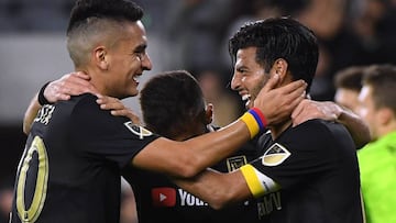 LOS ANGELES, CALIFORNIA - APRIL 13: Carlos Vela #10 of Los Angeles FC celebrates his goal, to take a 2-0 lead over FC Cincinnati, with Eduard Atuesta #20 and Diego Rossi #9 during a 2-0 win at Banc of California Stadium on April 13, 2019 in Los Angeles, California.   Harry How/Getty Images/AFP
 == FOR NEWSPAPERS, INTERNET, TELCOS &amp; TELEVISION USE ONLY ==