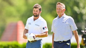 DETROIT, MI - JULY 29: Cameron Young and Davis Love III finish their rounds on the ninth green during the second round of the Rocket Mortgage Classic at Detroit Golf Club on July 29, 2022 in Detroit, Michigan. (Photo by Ben Jared/PGA TOUR via Getty Images)