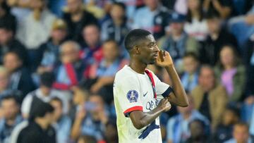 Paris Saint-Germain's French forward #10 Ousmane Dembele celebrates after scoring his team's second goal during the French L1 football match between Le Havre AC and Paris Saint-Germain (PSG) at The Stade Oceane in Le Havre, north-western France, on August 16, 2024. (Photo by LOU BENOIST / AFP)