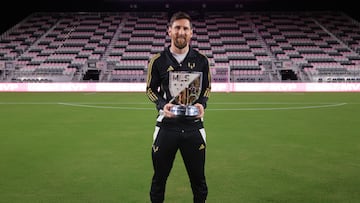 Dec 4, 2024; Ft. Lauderdale, Florida, USA; Inter Miami CF forward Lionel Messi (10) holds the London Donovan MVP Award during a presentation ceremony at Chase Stadium. Mandatory Credit: Sam Navarro-Imagn Images