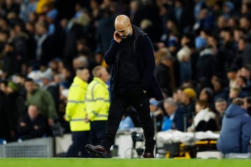 Soccer Football - Premier League - Manchester City v Manchester United - Etihad Stadium, Manchester, Britain - December 15, 2024 Manchester City manager Pep Guardiola looks dejected after the match Action Images via Reuters/Jason Cairnduff EDITORIAL USE ONLY. NO USE WITH UNAUTHORIZED AUDIO, VIDEO, DATA, FIXTURE LISTS, CLUB/LEAGUE LOGOS OR 'LIVE' SERVICES. ONLINE IN-MATCH USE LIMITED TO 120 IMAGES, NO VIDEO EMULATION. NO USE IN BETTING, GAMES OR SINGLE CLUB/LEAGUE/PLAYER PUBLICATIONS. PLEASE CONTACT YOUR ACCOUNT REPRESENTATIVE FOR FURTHER DETAILS..