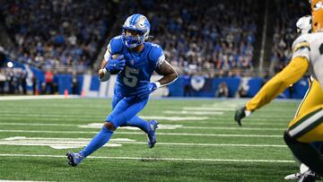 Dec 5, 2024; Detroit, Michigan, USA; Detroit Lions running back David Montgomery (5) runs untouched into the end zone for a touchdown against the Green Bay Packers in the first quarter at Ford Field. Mandatory Credit: Lon Horwedel-Imagn Images