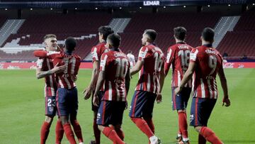 Soccer Football - La Liga Santander - Atletico Madrid v Real Valladolid - Wanda Metropolitano, Madrid, Spain - December 5, 2020  Atletico Madrid&#039;s Thomas Lemar celebrates scoring their first goal with Kieran Trippier and teammates REUTERS/Javier Barb