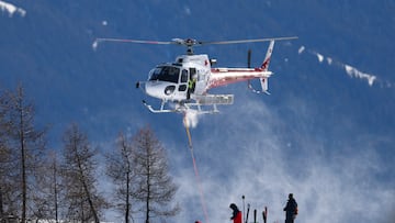 Alpine Skiing - FIS Alpine Ski World Cup - Men's Downhill - Crans-Montana, Switzerland - February 1, 2026
An air ambulance flies over the slope after Chile's Henrik Von Appen crashes during his run REUTERS/Denis Balibouse
