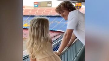 Griezmann and daughter Mia witness the Camp Nou echo