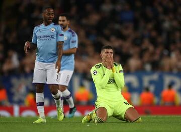 GNK Dinamo Zagreb's Dino Peric reacts as Manchester City's Raheem Sterling looks on