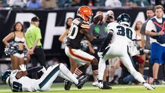 Aug 17, 2023; Philadelphia, Pennsylvania, USA; Cleveland Browns wide receiver Austin Watkins Jr. (80) makes a catch between Philadelphia Eagles safety Justin Evans (30) and cornerback Eli Ricks (39) before running it in for a touchdown during the third quarter at Lincoln Financial Field. Mandatory Credit: Bill Streicher-USA TODAY Sports