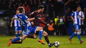 LA CORUNA, SPAIN - APRIL 29: Lionel Messi of FC Barcelona scores his team's fourth goal past Luisinho Correia of RC Deportivo La Coruna during the La Liga match between Deportivo La Coruna and Barcelona at Estadio Riazor on April 29, 2018 in La Coru