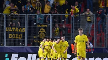 Bodoe/Glimt's fans celebrate after Bodoe/Glimt's Norwegian midfielder #19 Sondre Brunstad Fet scored the 2-2 goal during the UEFA Champions League football match between SK Slavia Prague and FK Bodoe/Glimt in Prague on September 17, 2025. (Photo by Michal Cizek / AFP)
