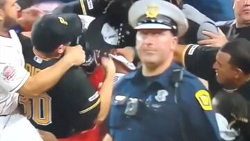 Baseball: Policeman gloriously unfazed as Pirates, Reds brawl