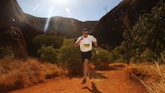 AYERS ROCK, AUSTRALIA - 16 JUNE 2018: (EDITORS NOTE: A polarizing filter was used for this image.) Australian olympic bobsledder Lachlan Reidy competes in the Uluru Relay Run as part of the National Deadly Fun Run Championships on June 16, 2018 in Uluru, Australia. The annual running event is held a short distance from Uluru drawing runners from Indigenous communities across Australia selected from participating in the Deadly Fun Run Series. (Photo by Mark Kolbe/Getty Images for AOC)