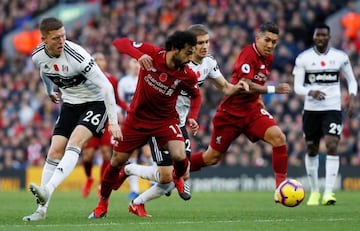 Liverpool's Mohamed Salah in action with Fulham's Alfie Mawson