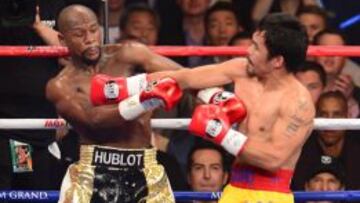 Floyd Mayweather gana el combate del siglo a los puntos